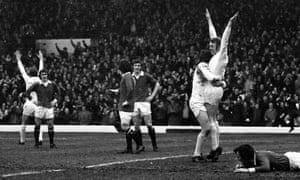 Mick Jones is congratulated on scoring one of his three goals during the match.
