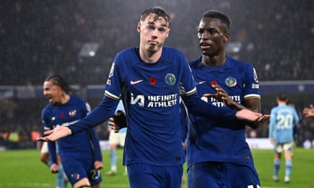 Cole Palmer shrugs after scoring against Manchester City