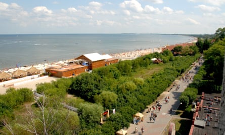 Looking from the lighthouse onto the promenade along the south beach and Baltic Sea shores in the spa Sopot in Pomerania, Poland