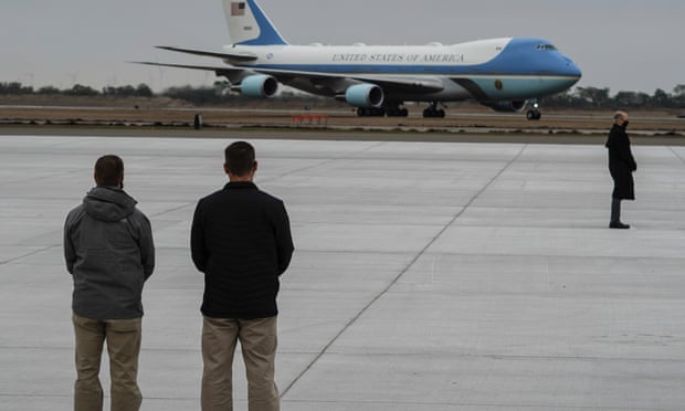 Members of Secret Service stand guard as Air Force One, with Trump aboard, lands at Valley International Airport in January 2021.