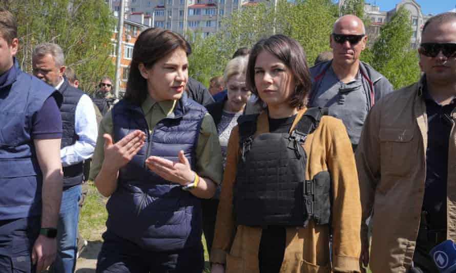 German Foreign Minister Annalena Baerbock, right, and Ukrainian Prosecutor General Iryna Venediktova near a mass grave in Bucha, on the outskirts of Kyiv, Ukraine.