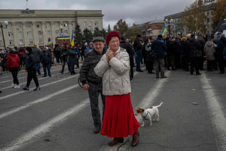 Local residents gather to celebrate the liberation of Kherson on 13 November.