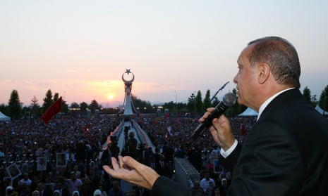 Recep Tayyip Erdoğan speaks to marchers at the Bosphorus bridge, which has been renamed the July 15 Martyrs bridge.