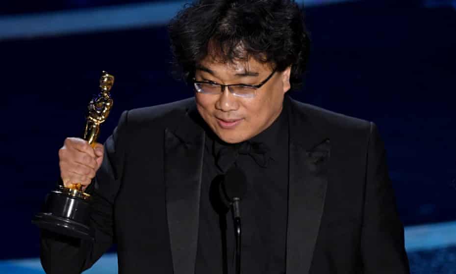Bong Joon-ho with his best director award at the 92nd Academy Awards.
