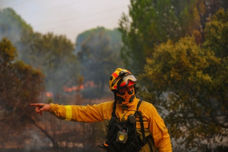 Firefighters battle a wildfire in San Martin de Valdeiglesias, west of Madrid, on 26 July 2026.