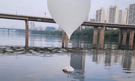 This photo released by South Korea Defense Ministry, shows a balloon presumably sent by North Korea, on the Han River in Seoul on Sunday, 9 June