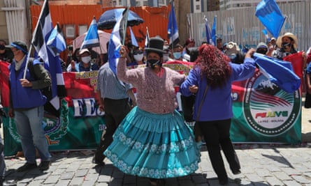 Mas supporters celebrate in La Paz, Bolivia, on 19 October.