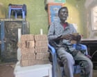 ‘It’s like we went bankrupt overnight’: poorest Somalis suffer as piles of worthless shillings mount up