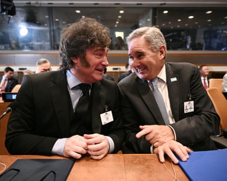 Milei and Quirno lean into each other as they laugh during a meeting on the sidelines of the UN general assembly