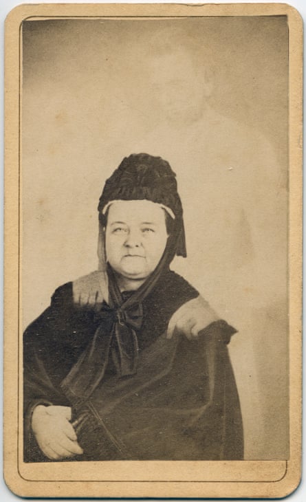 Mary Todd Lincoln with the ghost of her late husband, Abraham Lincoln, apparently standing behind her, circa 1870