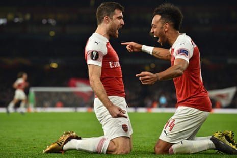 Arsenal’s Sokratis Papastathopoulos (left) celebrates with Pierre-Emerick Aubameyang after scoring their third goal.