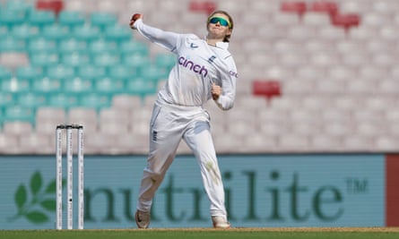 Charlie Dean bowls for England in Mumbai.