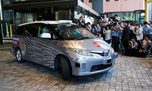 The RoboCar MiniVan at the start of its test in Tokyo