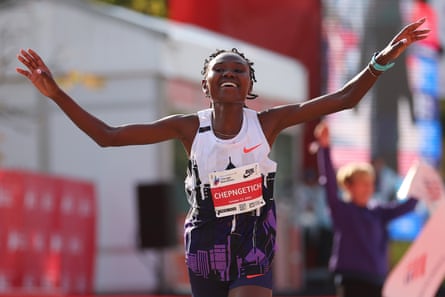 Ruth Chepngetich of Kenya crosses the finish line to win the 2024 Chicago Marathon