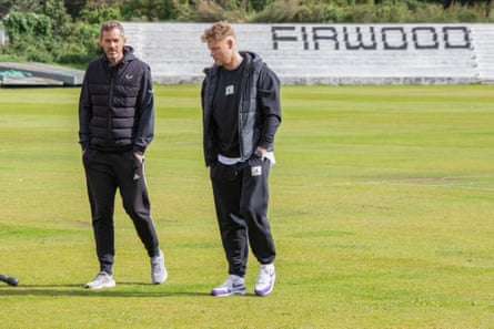 Assistant coach Kyle Hogg with Flintoff.