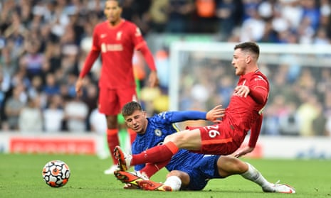 Chelsea’s Mason Mount and Liverpool’s Andy Robertson tangle during the dramatic 1-1 draw at Anfield