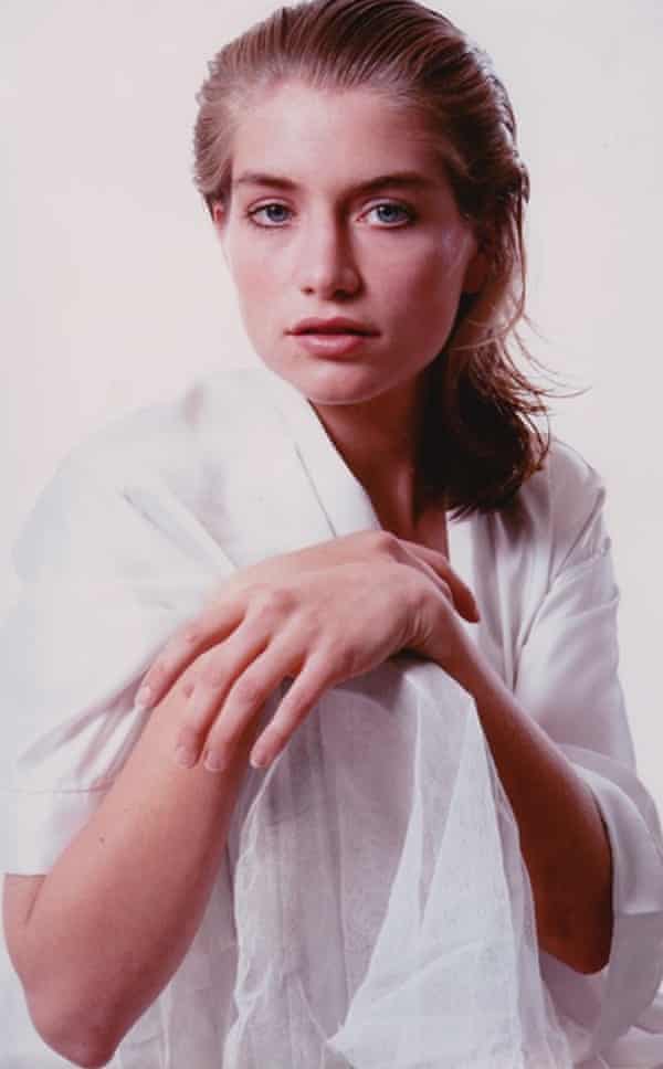 A modelling shot of Marianne Shine in 1985, with long light brown hair swept back, and wearing a white shirt