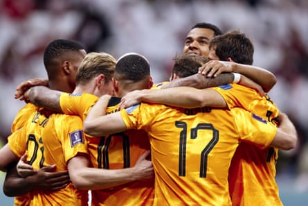 The Dutch celebrate during their 2-0 win over Qatar.