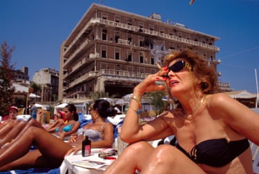 The Middle East 1991 – 2008Overview of Beirut in 1996, and the changes occuring since the end of Lebanon’s 15-year civil war. Sun bathers at the yacht club adjoining the war-scarred Hotel Saint-Georges, symbol of Beirut’s glamorous past and ground zero during the civil war.