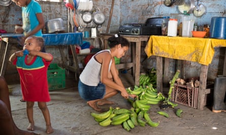 A family in their home at the Banafrucoop near Santa Marta.