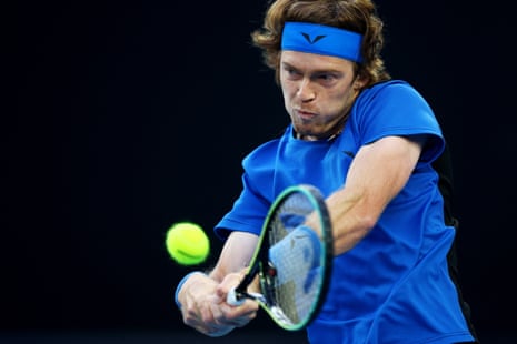 Andrey Rublev hits a backhand.