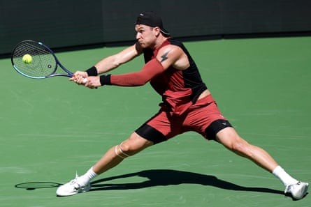 Jack Draper stretches to stay in a point in his gritty victory against Roberto Bautista Agut.