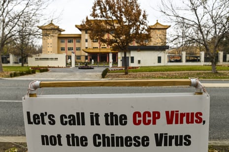 A sign reading ‘ Let’s call it the CCP Virus, not the Chinese Virus’ is seen outside the Chinese Embassy in Canberra, Monday, June 29, 2020.