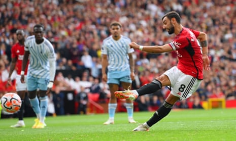 Bruno Fernandes of Manchester United scores the team's third goal against Nottingham Forest from the penalty-spot.