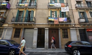 Banners reading ‘No tourism apartments’ hang from balconies in Barcelona.