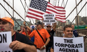 Following a rally in Brooklyn’s Cadman Plaza Park, hundreds
of union members march across the Brooklyn Bridge in support of
IBEW Local 3 (International Brotherhood of Electrical Workers),
September 18, 2017 in New York City. More than 1800 members of
IBEW Local 3 are entering their sixth month of a strike in a
contract dispute with Charter Communications/Spectrum.