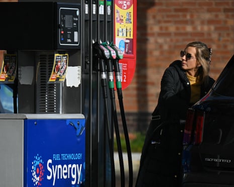 A motorist refuels a vehicle with diesel fuel at an Esso petrol station in Lutterworth, near Rugby in central England.