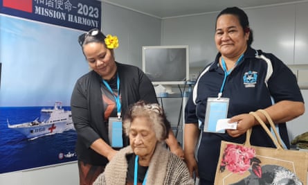 Ramona Moala, centre, visits the Chinese hospital ship in Tonga with her nieces Kolofoou Tongatapu.