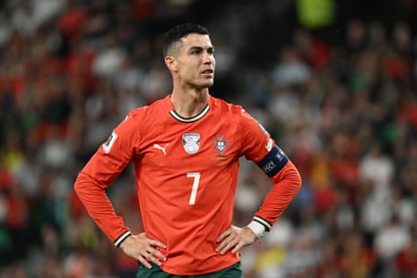 Cristiano Ronaldo stands with hands on hips