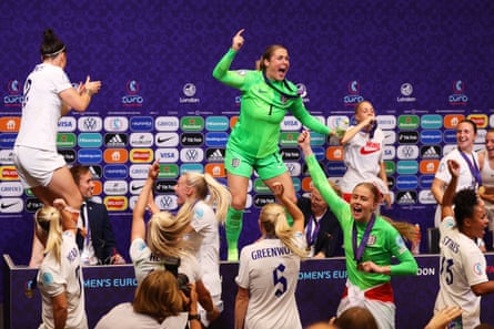 Lucy Bronze and Mary Earps dance on the Press Conference table as the England players interrupt Sarina Wiegman’s press conference after the win over Germany in the Euro 2022 final at Wembley.