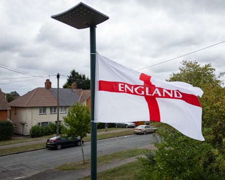 A St George flag on a residential street.