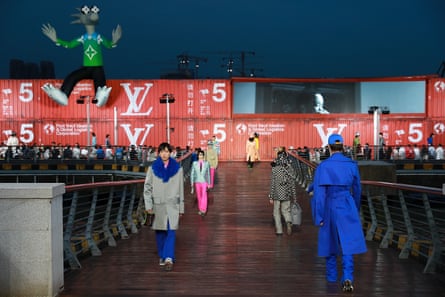 Models walk the runway during the Louis Vuitton spring//summer 2021 men’s collection in Shanghai