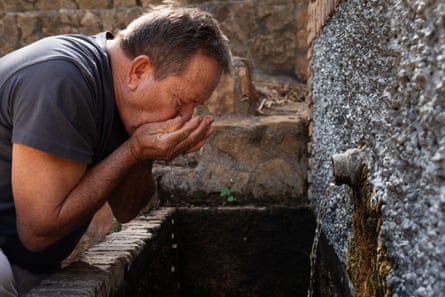 Francisco López, drinking at a fountain in Cónchar, Spain, is among local campaigners who have collected signatures and organised marches in protest at water-bottling plants.