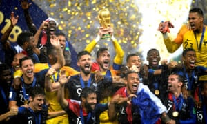 France’s Hugo Lloris lifts the World Cup trophy as they celebrate winning.