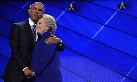 TOPSHOT - US President Barack Obama (L) hugs US Presidential nominee Hillary Clinton during the third night of the Democratic National Convention at the Wells Fargo Center in Philadelphia, Pennsylvania, July 27, 2016. / AFP PHOTO / Robyn BECKROBYN BECK/AFP/Getty Images