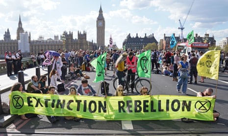 Demonstrators take part in an Extinction Rebellion protest on Westminster Bridge in central London