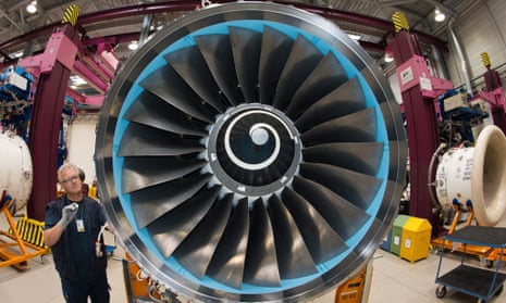 A Rolls-Royce mechanic working on a plane engine in the factory in Dahlewitz, Germany