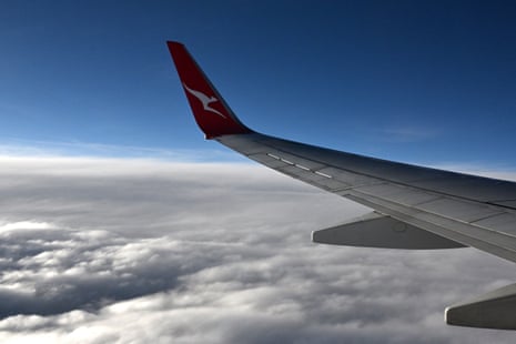 A Qantas plane in the air.