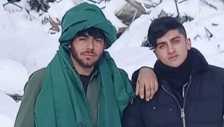 Arifullah Fazli (left) with a friend in the mountains in eastern Afghanistan.