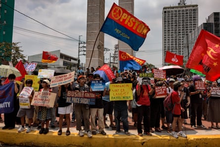 Transport workers and activists take part in a protest as they stage a strike over surging fuel costs.