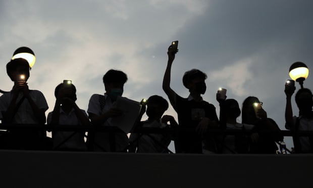 Students form a human chain during an anti-government protest in Sha Tin district in Hong Kong.
