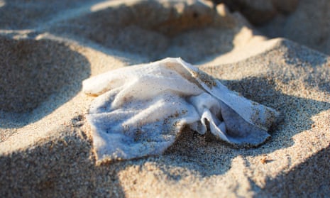 Wet wipes polluting a UK beach.