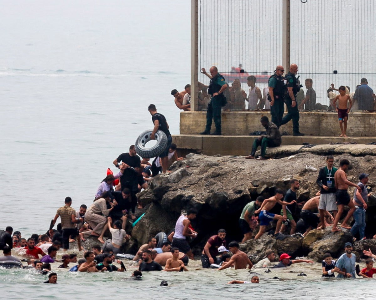 Spain sends extra troops and police to Ceuta after thousands of migrants arrive | Migration | The Guardian