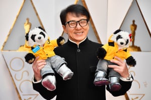 Actor Jackie Chan with some pandas