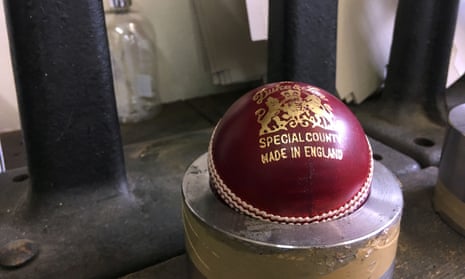 A Dukes ball in the final stage of production at the British Cricket Balls Ltd factory in Walthamstow, London.