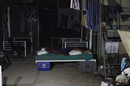 A refugee sleeps inside the Manus Island detention centre